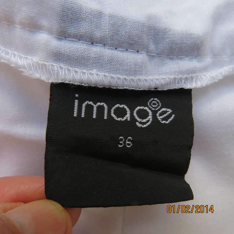 As new white gored skirt with wide yoked waistband.Zip at size. Size 36 by IMAGE.2Layers polycotton.