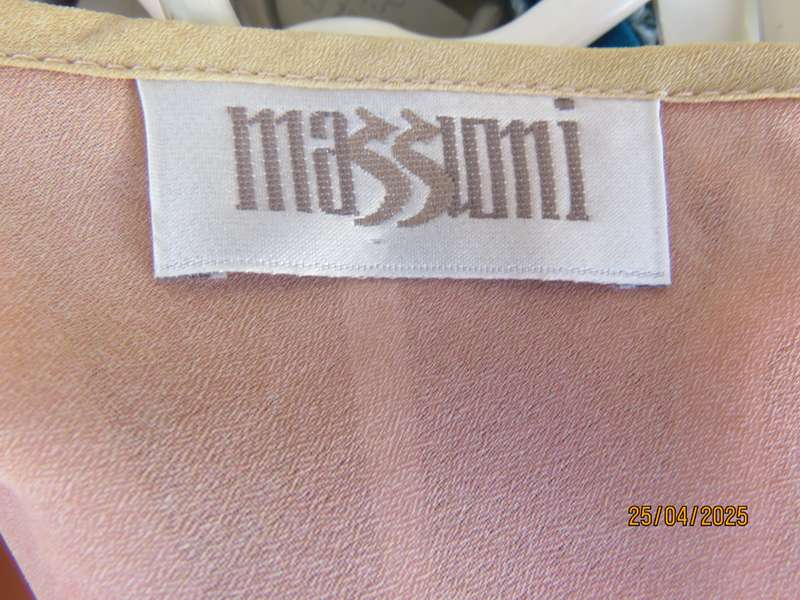 Slip over top in shades of peach colours with decoration on front. Size 36.
