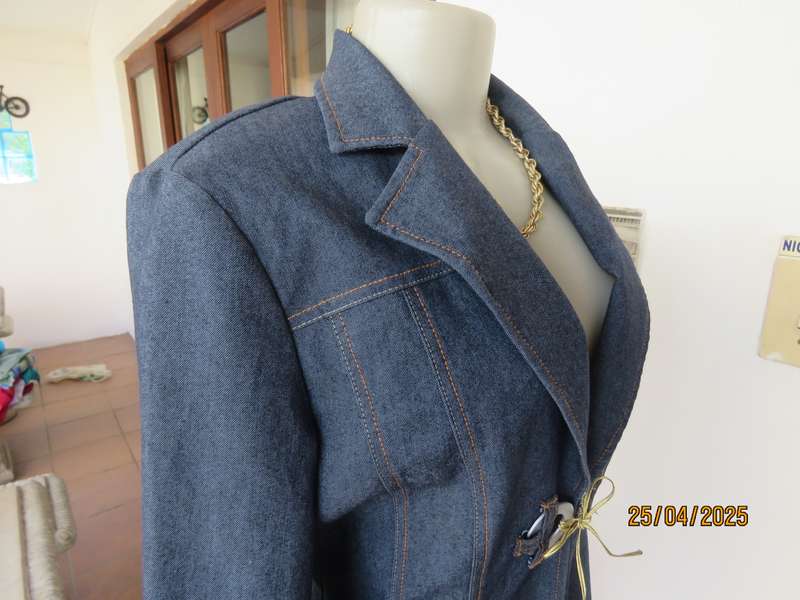 WWW stretch polycotton denim styled jacket. One hook-eye closure. Size 38.