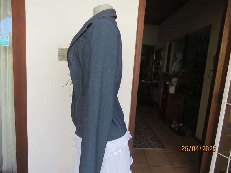 WWW stretch polycotton denim styled jacket. One hook-eye closure. Size 38.