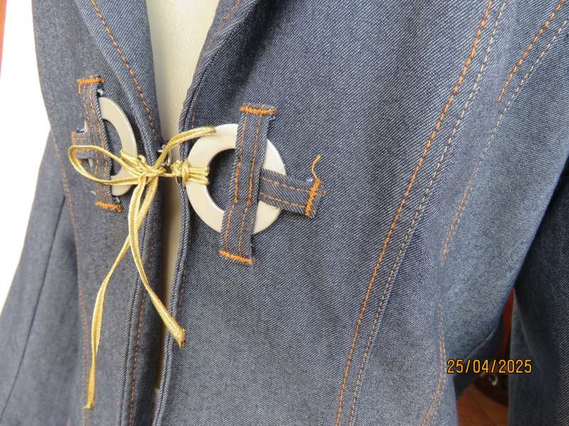 WWW stretch polycotton denim styled jacket. One hook-eye closure. Size 38.