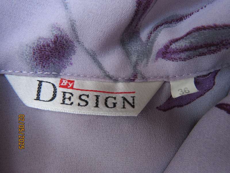 BY DESIGN pale lilac long cuffed sleeve top with violet-grey flowers. Size 36.