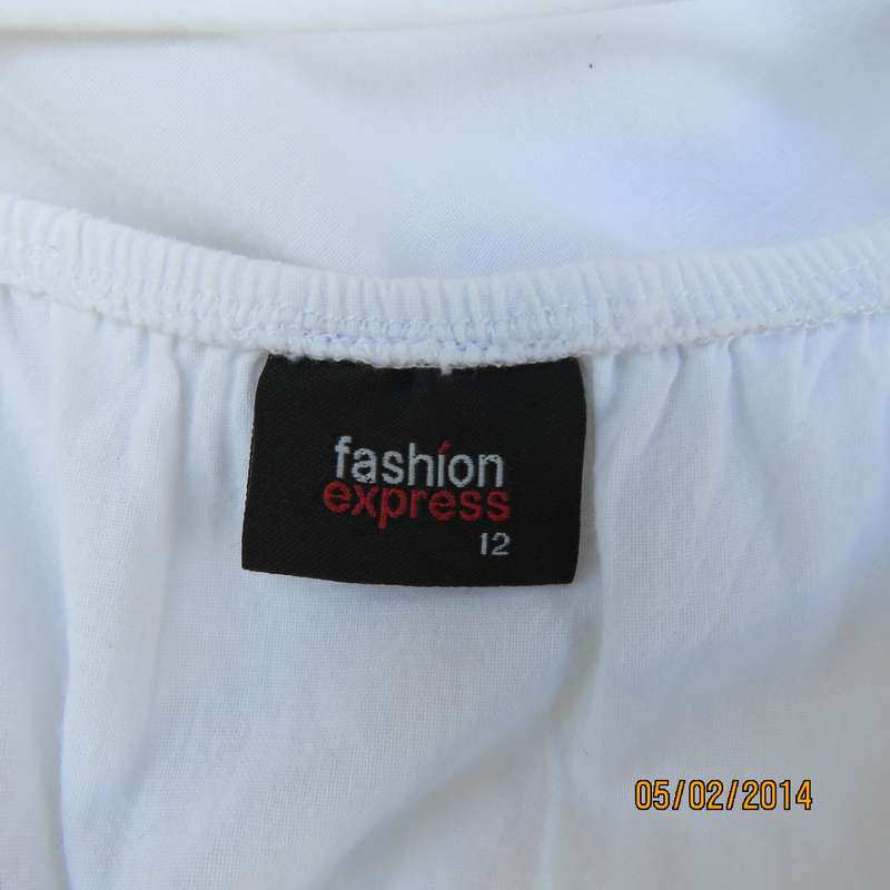 As new white slightly creased 100% cotton strappy dress. Size 36.Elasticated waist.Half flare skirt.