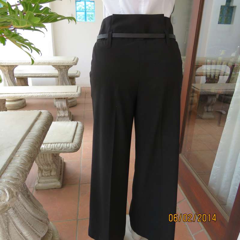 Top of the line black high waisted WOOLWORTHS poly-viscose strech black pants.Size 34+.As new cond