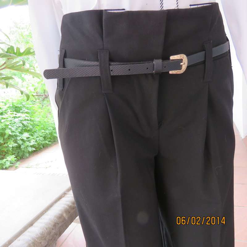 Top of the line black high waisted WOOLWORTHS poly-viscose strech black pants.Size 34+.As new cond