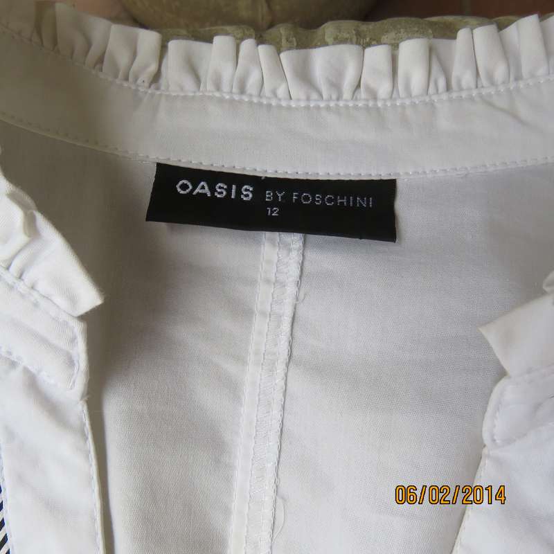 High quality white stretch polycotton OASIS long sleeve tailored top size 36. Sequin decoration.