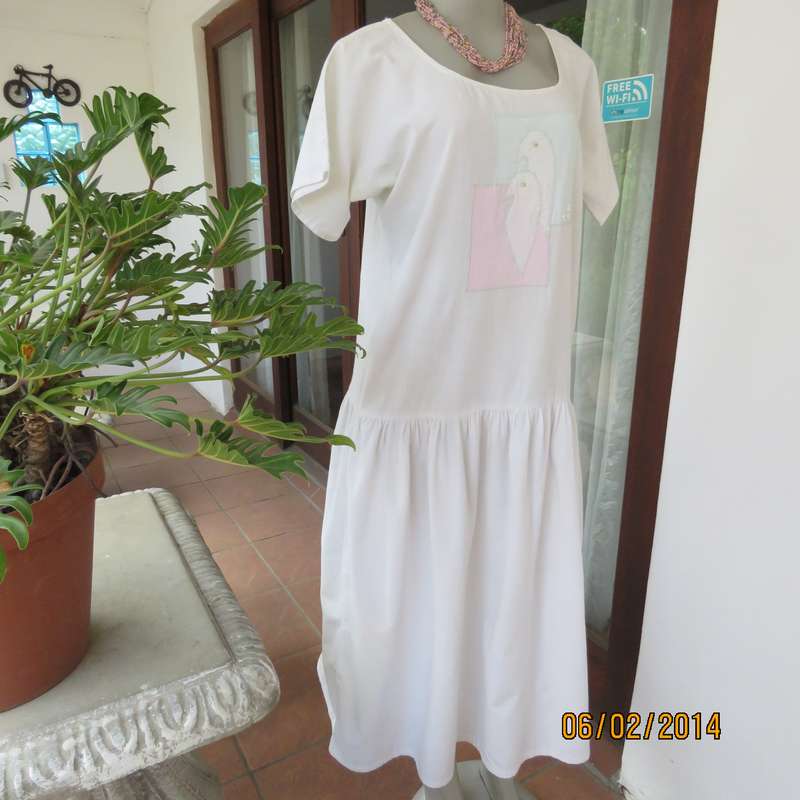 Typical 80's boutique made boutique made dropped waist appliqued dress .Natural colour.Size 36