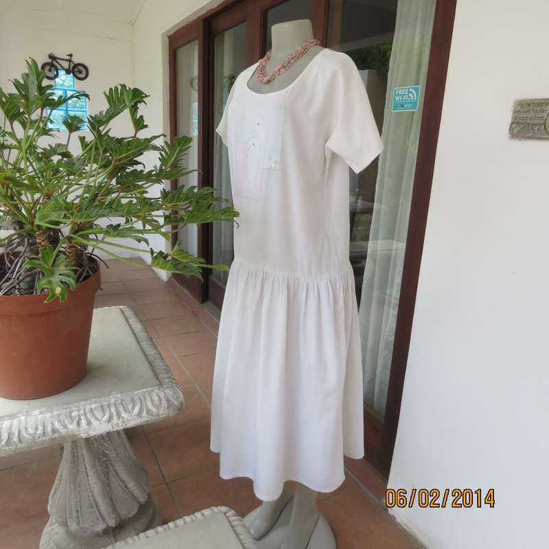 Typical 80's boutique made boutique made dropped waist appliqued dress .Natural colour.Size 36