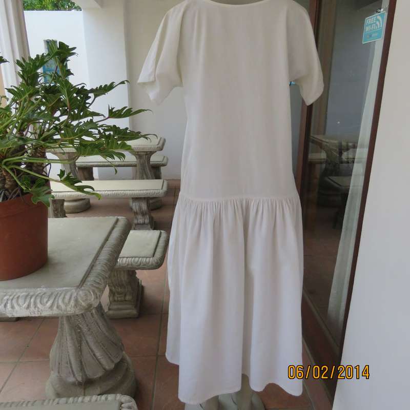 Typical 80's boutique made boutique made dropped waist appliqued dress .Natural colour.Size 36