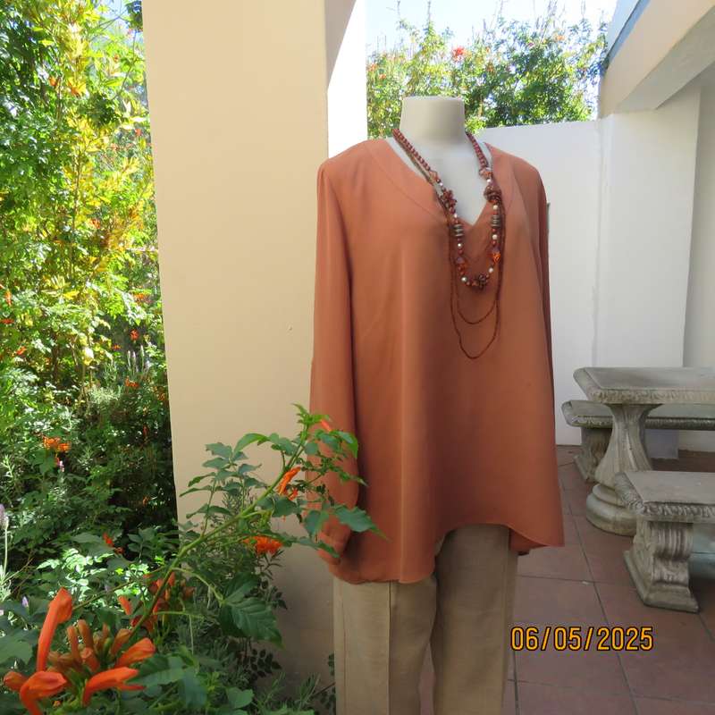 PENNY C dark coral colour long cuffed sleeve V neck top. Size 48-24. As new.