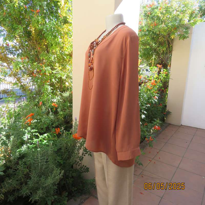 PENNY C dark coral colour long cuffed sleeve V neck top. Size 48-24. As new.