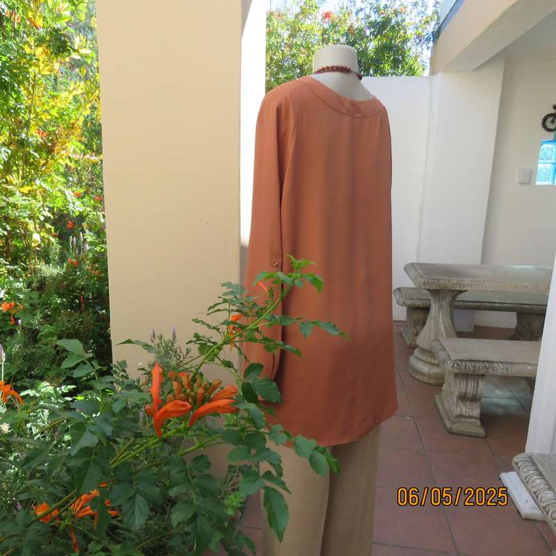 PENNY C dark coral colour long cuffed sleeve V neck top. Size 48-24. As new.