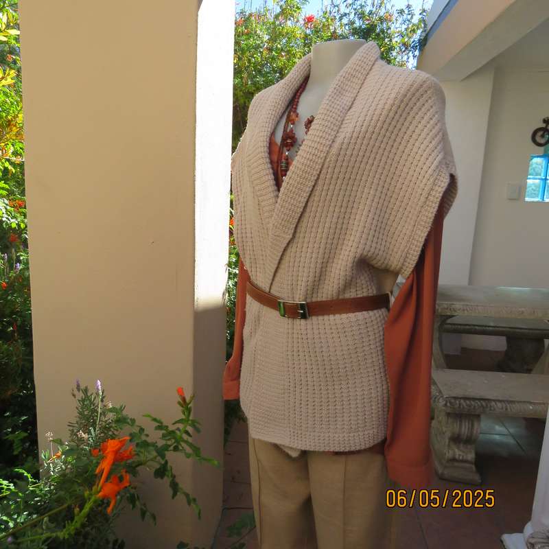 Beige fold over acrylic knit waistcoat style top. Front rib stitch. Size 42. As new.