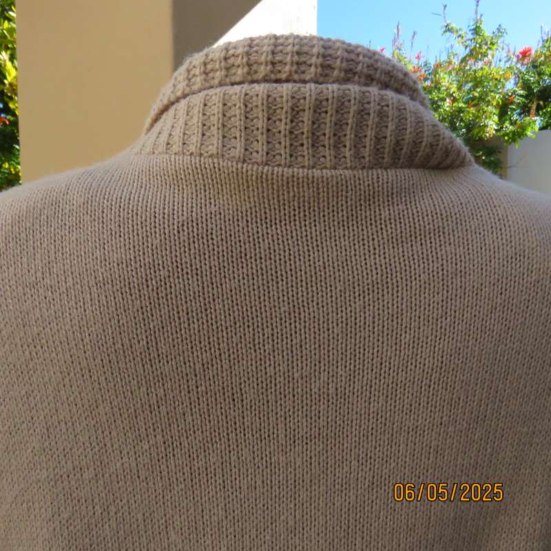 Beige fold over acrylic knit waistcoat style top. Front rib stitch. Size 42. As new.