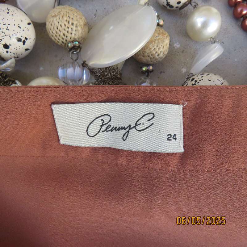 PENNY C dark coral colour long cuffed sleeve V neck top. Size 48-24. As new.