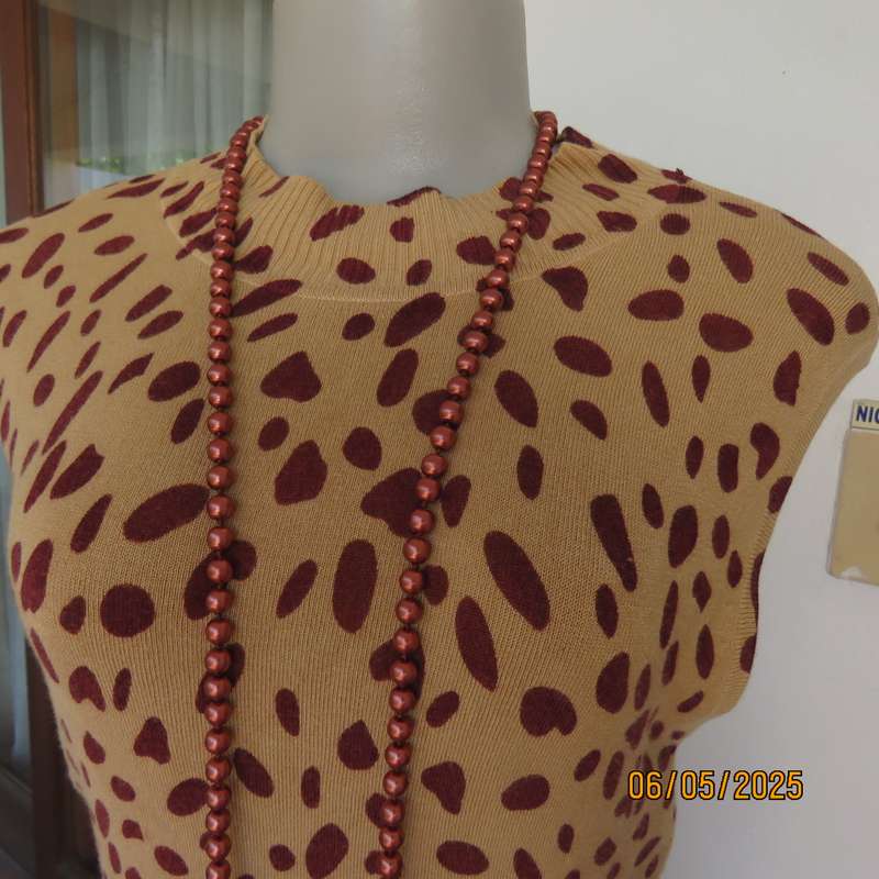 PRIVATE PROPERTY dark cream knitted crew neck top with dark burgundy animal print. Size 34-36