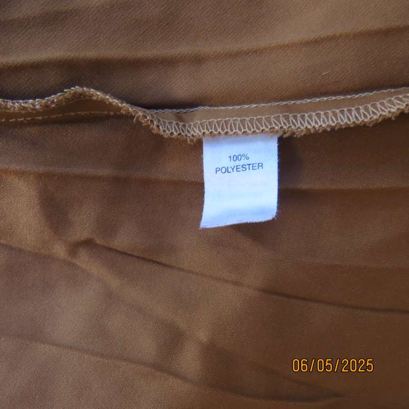 Rich cream crinkled polyester with suede look gored skirt size 48. As new