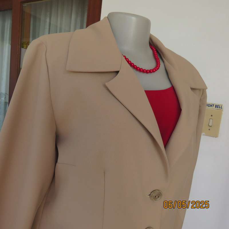 Boutique made rich cream 2pc pantsuit. Long sleeve jacket with 2 button closure. Size 40.