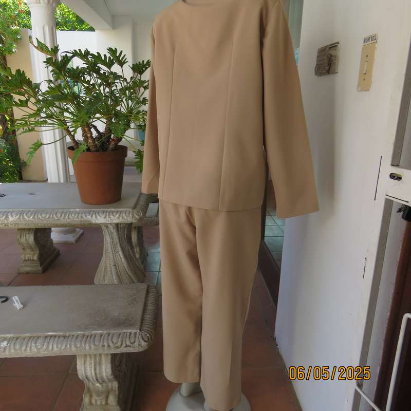 Boutique made rich cream 2pc pantsuit. Long sleeve jacket with 2 button closure. Size 40.