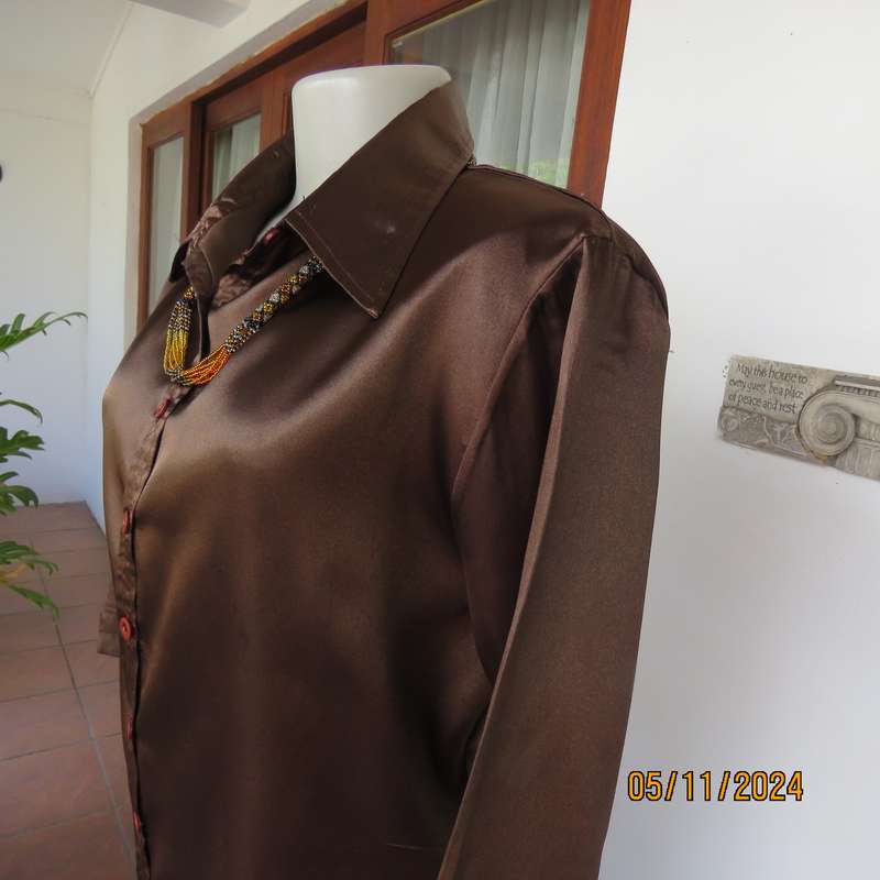 Choc brown silky polycotton button down top with shirt collar. Size 36. Elbow sleeves. As new.