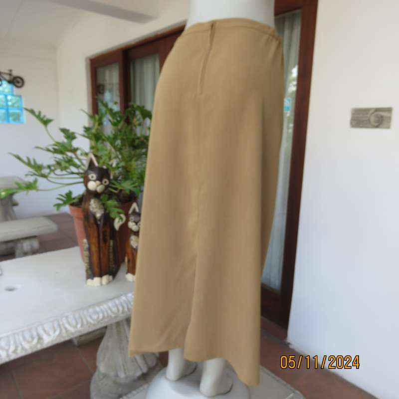 Elegant bronze colour pencil skirt by DONNA CLAIRE size 48. Elasticated back waist sides. As new.