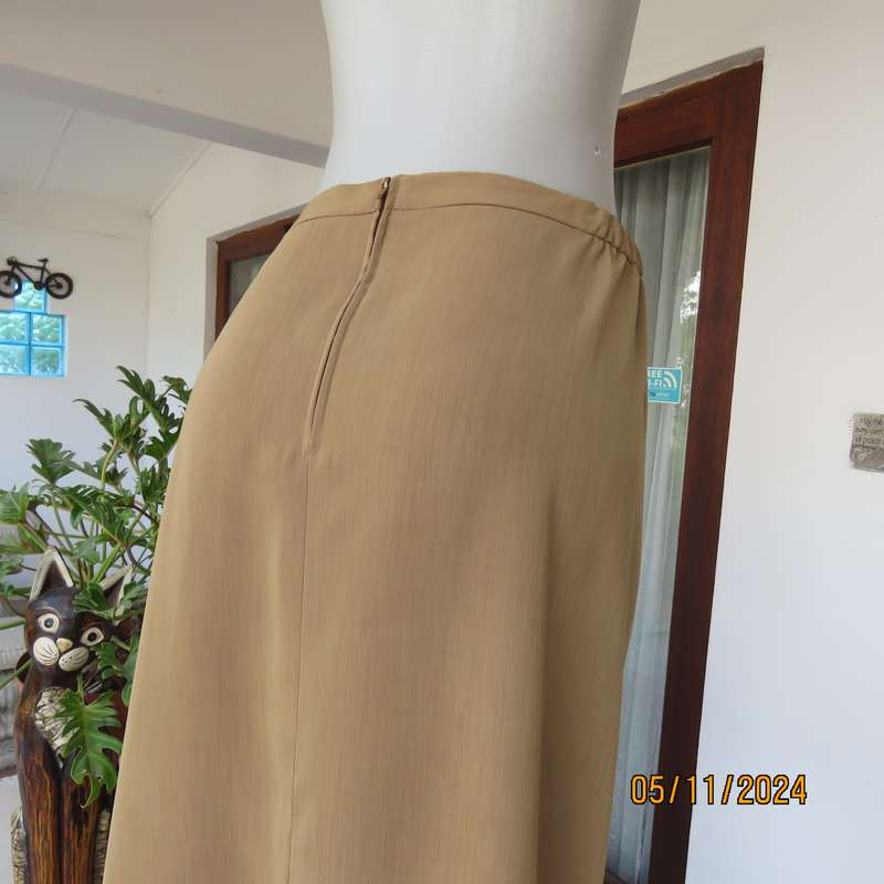 Elegant bronze colour pencil skirt by DONNA CLAIRE size 48. Elasticated back waist sides. As new.