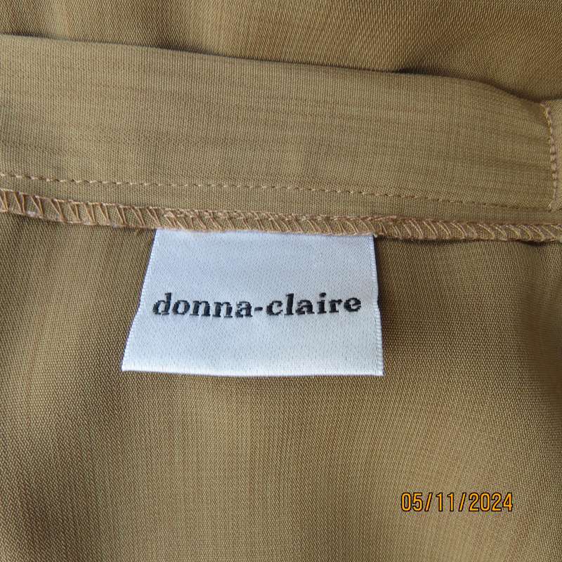 Elegant bronze colour pencil skirt by DONNA CLAIRE size 48. Elasticated back waist sides. As new.