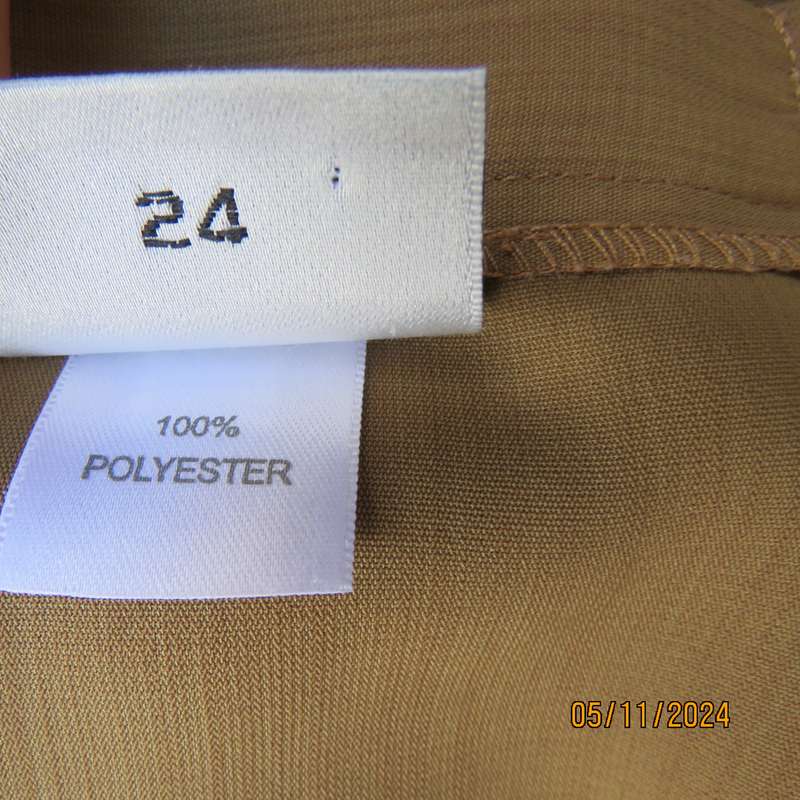 Elegant bronze colour pencil skirt by DONNA CLAIRE size 48. Elasticated back waist sides. As new.
