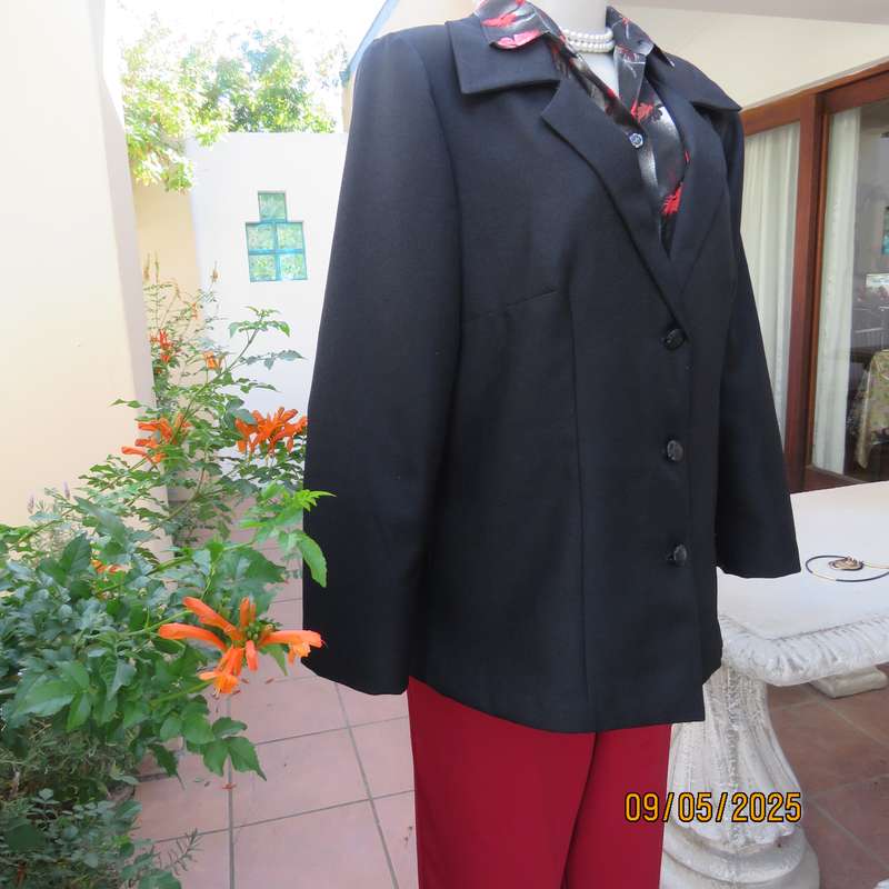 Boutique made black textured polyester long sleeve fully lined size 40 jacket.