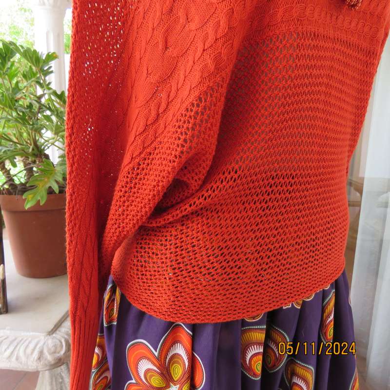 Burnt orange cotton knit long sleeve top. Horizontal cable knit across front and sleeves.Size 36.