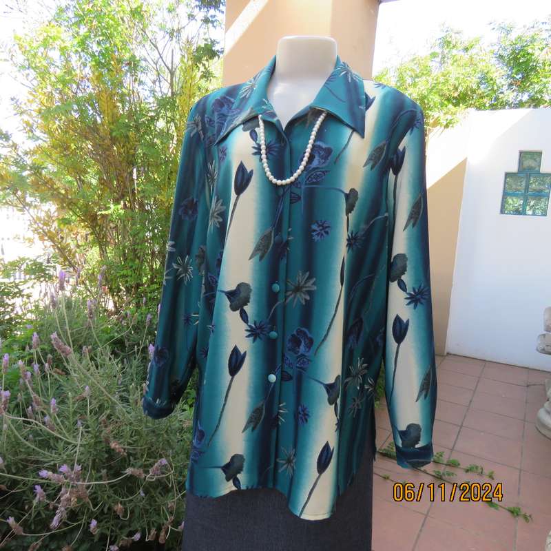 Smart long cuffed sleeve RENE TAYLOR text. polyester top in jade-blue shades.Floral design.Size 42