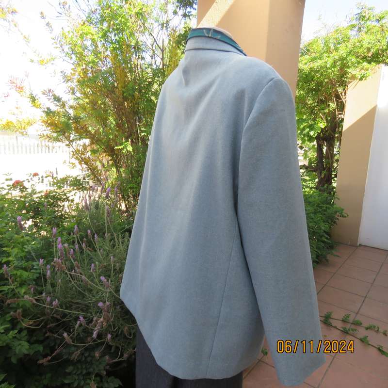Boutique made light blue polyester-wool blend long sleeve jacket. Open collar.One button.Size 50-52