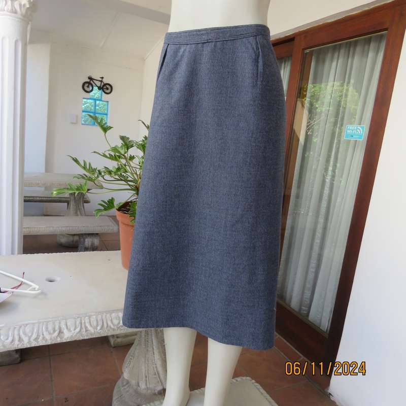 Blue fine check polycotton fully lined pencil skirt. Zip at back.Size 50-26.Owner made.Very good con