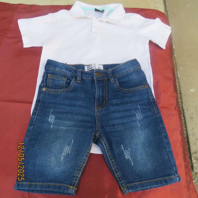 Set of blue denim jean shorts and white golf shirt for 6 to 7 year old boy.