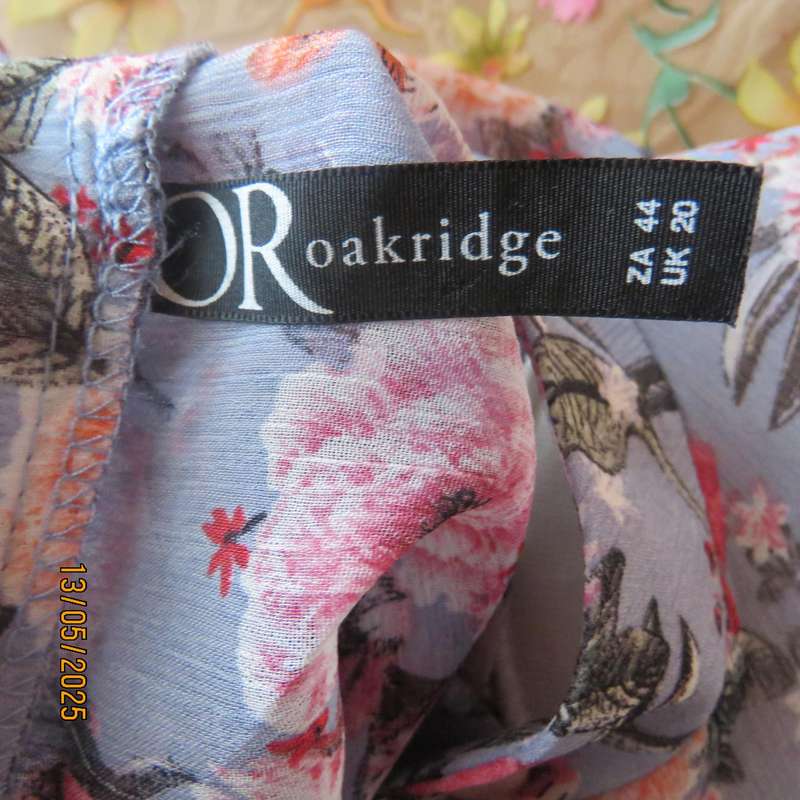 Steel blue slightly creased sheer polyester long sleeve top. Crimson flowers. Size 44