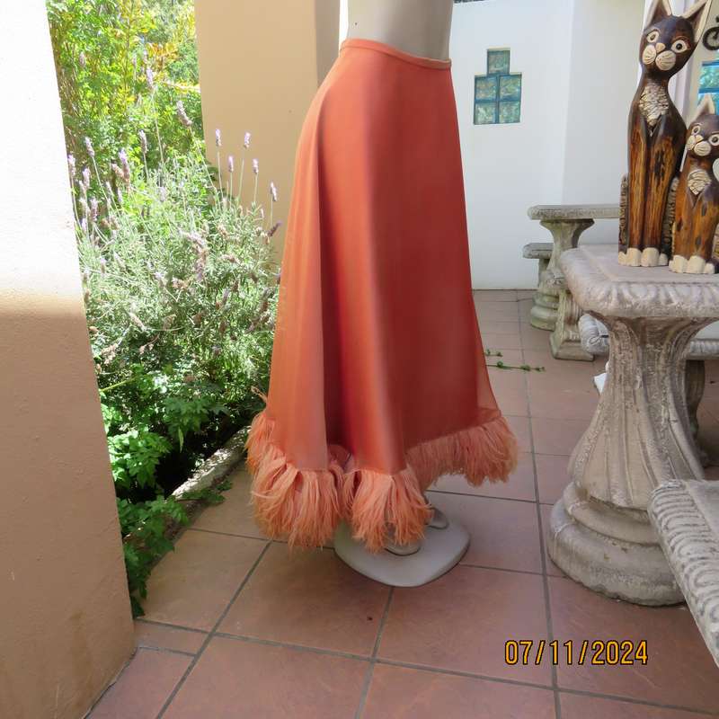 Glamorous half flare peach long skirt-underlay idark crimson satin. Size 36-38.Ostrich feather seam