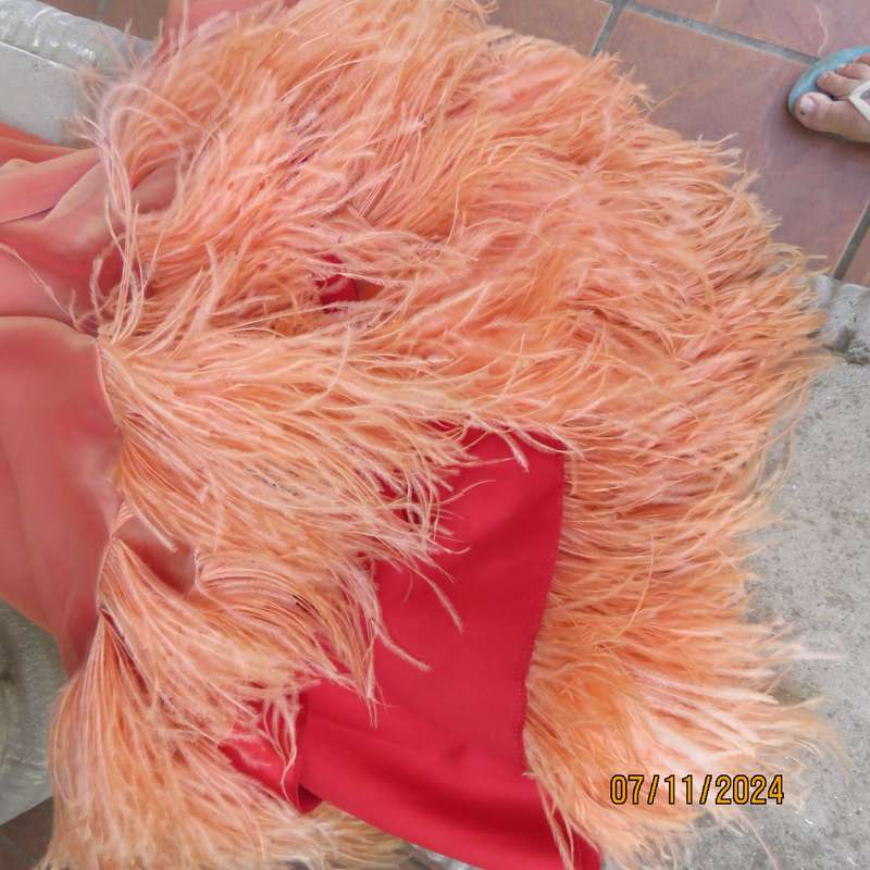 Glamorous half flare peach long skirt-underlay idark crimson satin. Size 36-38.Ostrich feather seam