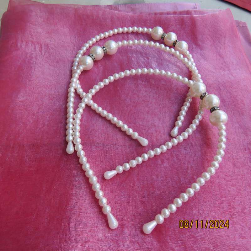 Lot of three faux pearl bendable hairbands. Very pretty. Price for all 3 . New