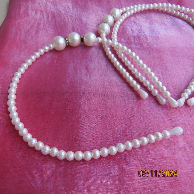 Lot of three faux pearl bendable hairbands. Very pretty. Price for all 3 . New