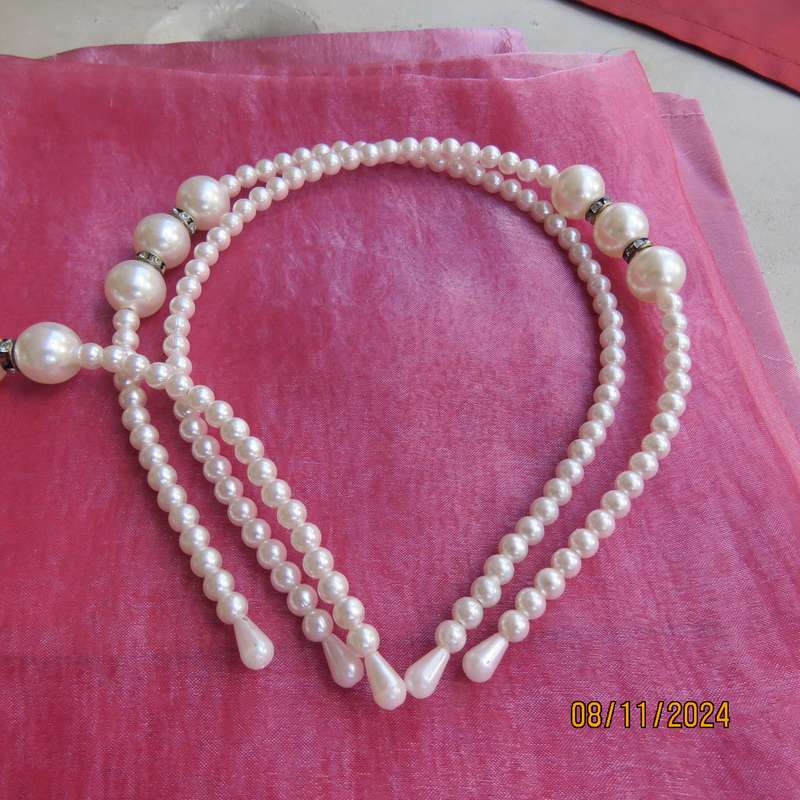 Lot of three faux pearl bendable hairbands. Very pretty. Price for all 3 . New