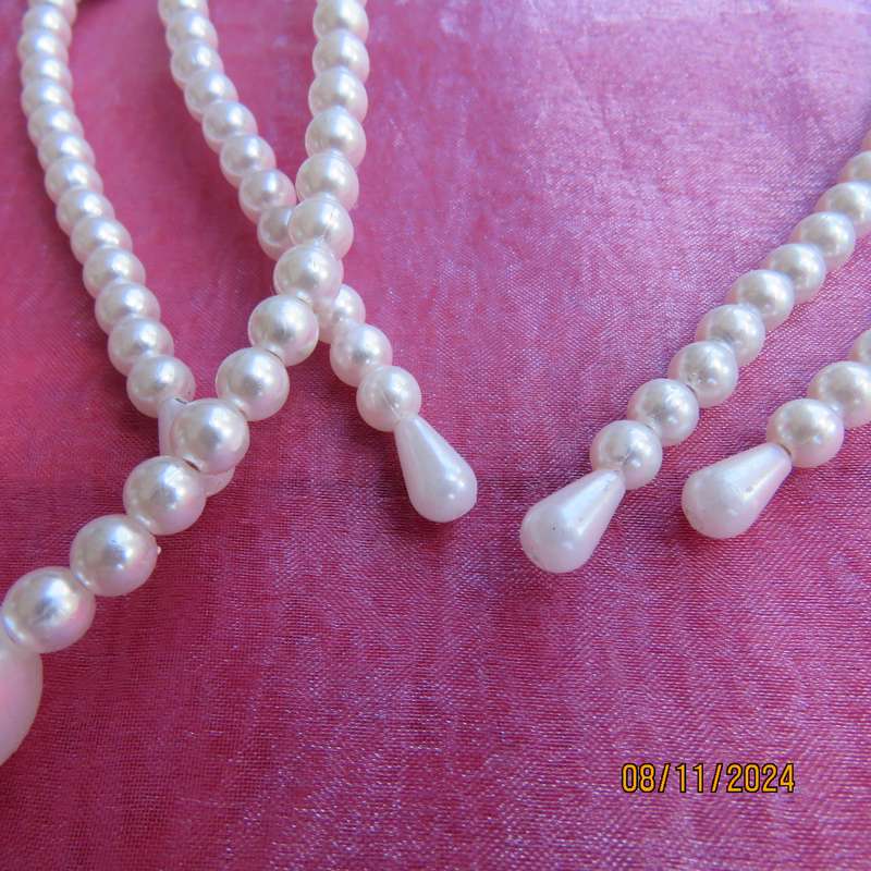 Lot of three faux pearl bendable hairbands. Very pretty. Price for all 3 . New