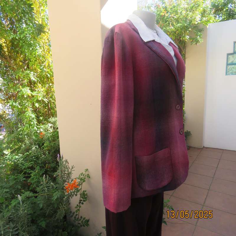 Warm woolen fully lined long sleeve jacket size 40 in reds-pinks and navy.