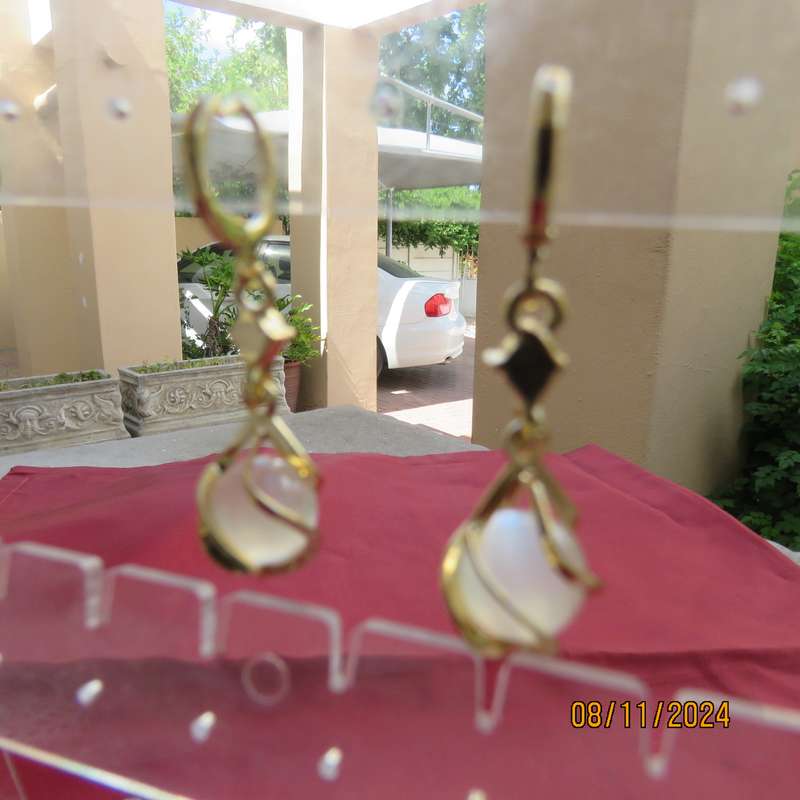 Cute milky stone hanging earrings with faux diamond. Hanging length 3cm. New item.