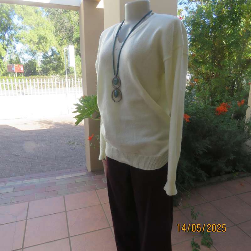 Plain light cream handknit acrylic sweater size 36-38. V neck.