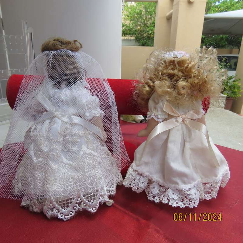 Set of 2 pretty antique bridal white dressed collectable dolls. Height 16cm. Long hair. All limbs.