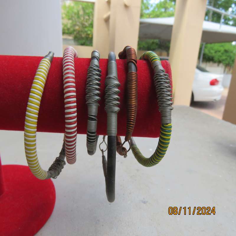 Selection of 6 ethnic different size bangles made from copper-stainless steel wire-plastic. New
