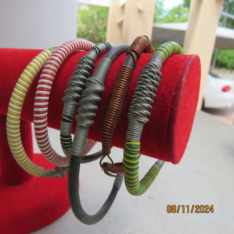 Selection of 6 ethnic different size bangles made from copper-stainless steel wire-plastic. New