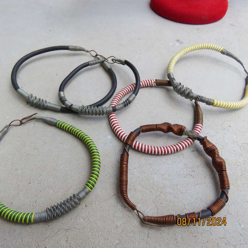 Selection of 6 ethnic different size bangles made from copper-stainless steel wire-plastic. New