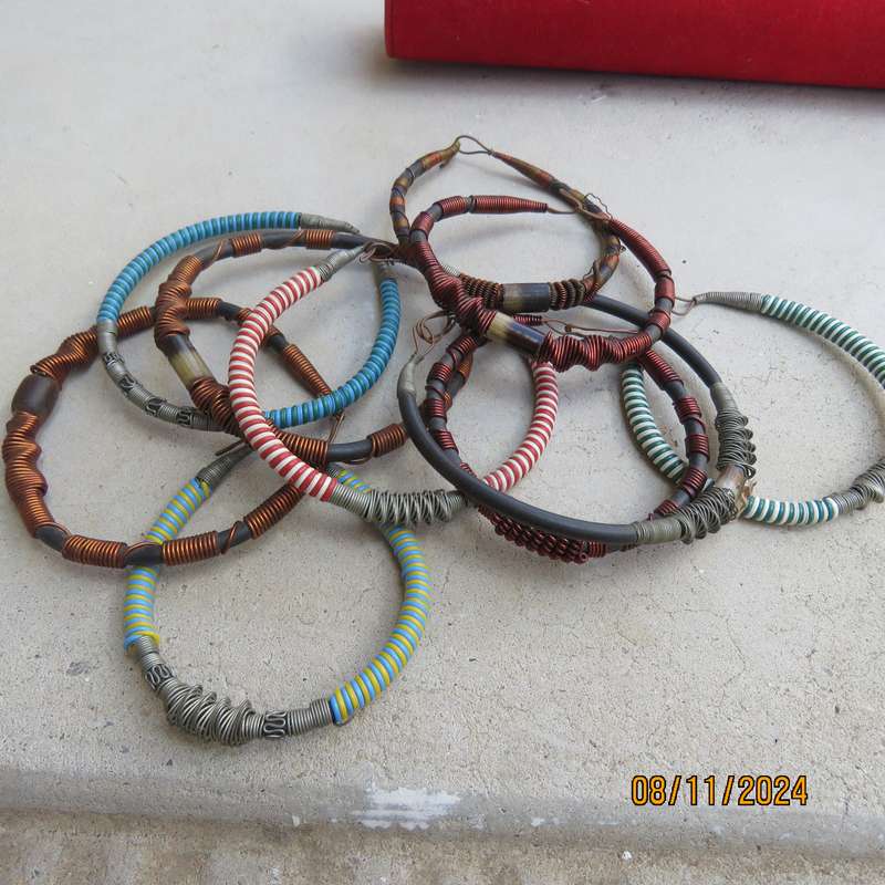 Selection of 10 popular ethnic bangles made from copper-steel wire-plastic-bone. Never used.