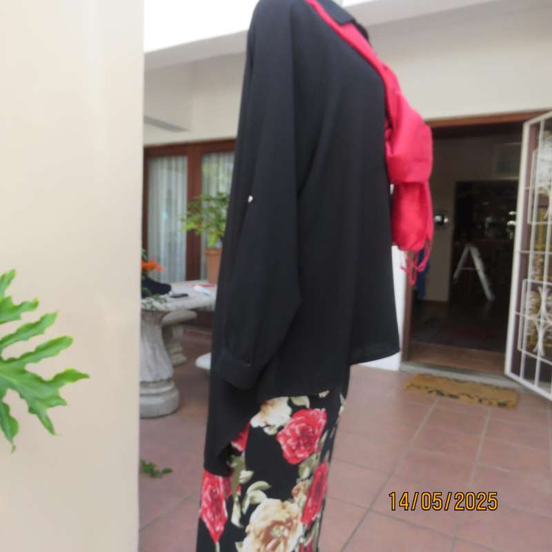Very black AMARA long raglan sleeve button down textured polyester top. Size 46